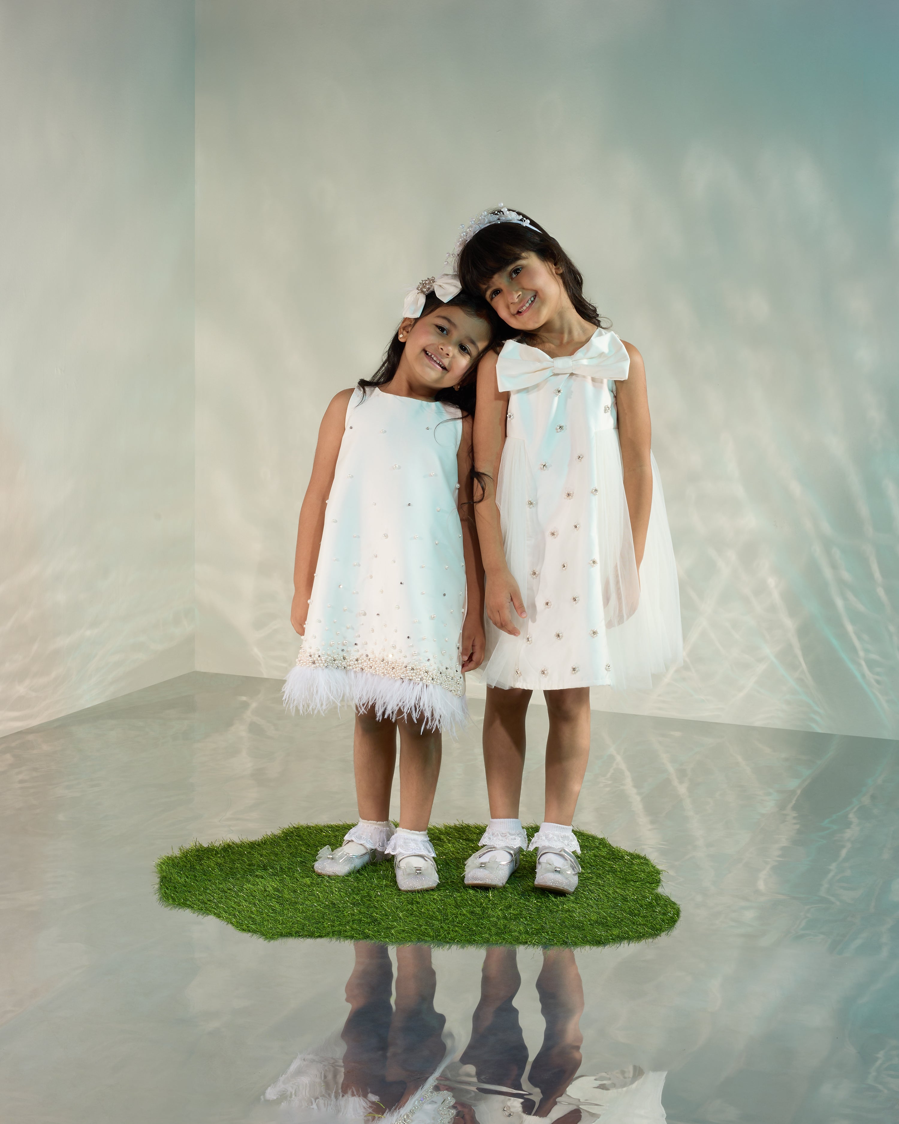White Shift Dress with Feathers and Pearls at Hem COCO